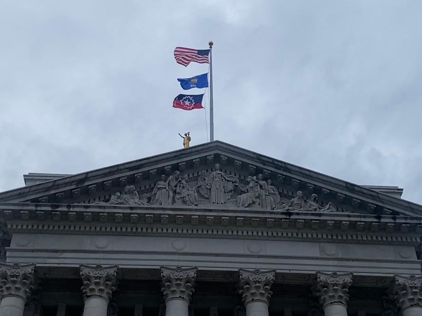 Governor Evers raises flag in honor of Juneteenth